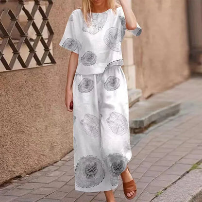 Autumn New Women's Fashion Printed Cotton Linen Plant Flower Three Sleeve Short Sleeved Casual Nine Piece Pants Two-piece Set