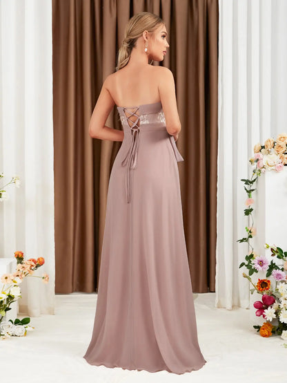 The adult formal dress is wrapped around the chest and decorated with a belt on the back